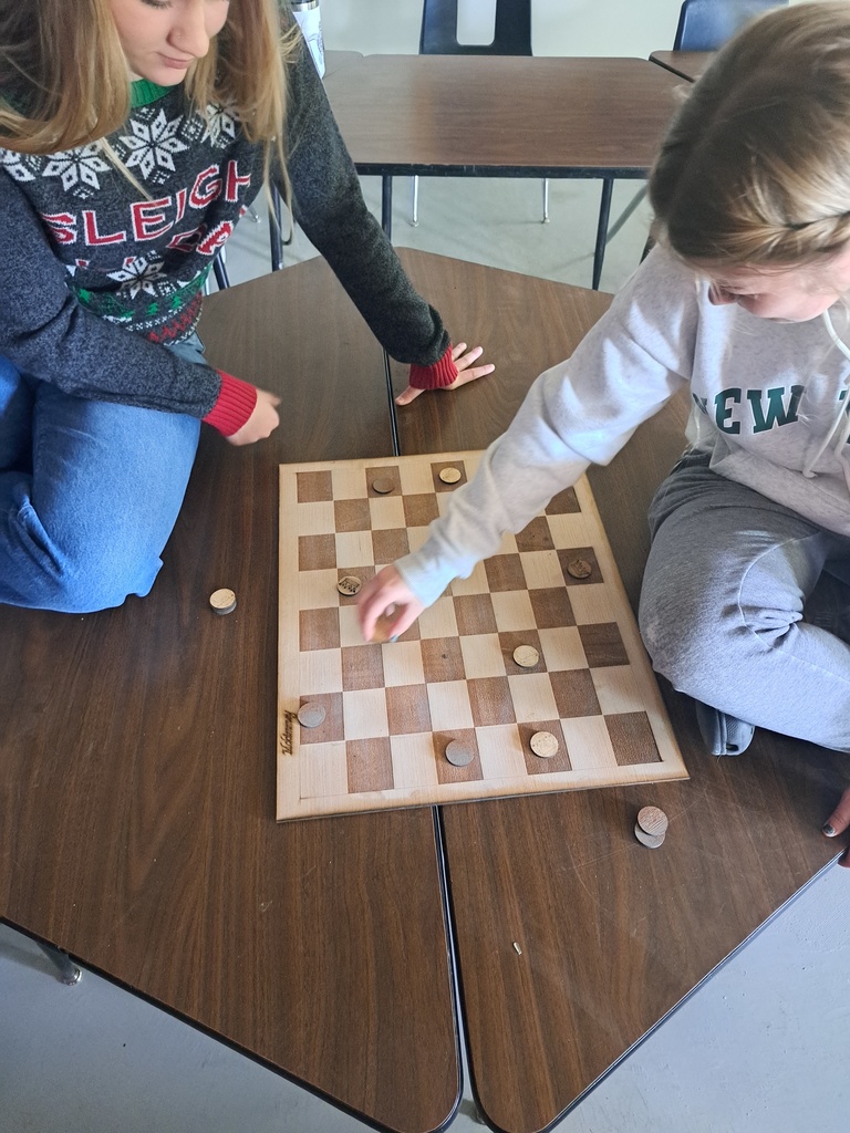 What game are they playing?  Hint, it's also the name of Richard Nixon's presidential dog.