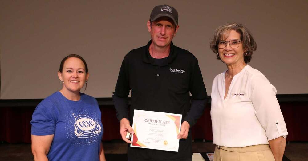 GCTC instructor Cliff Kincade is awarded teacher of the year award.