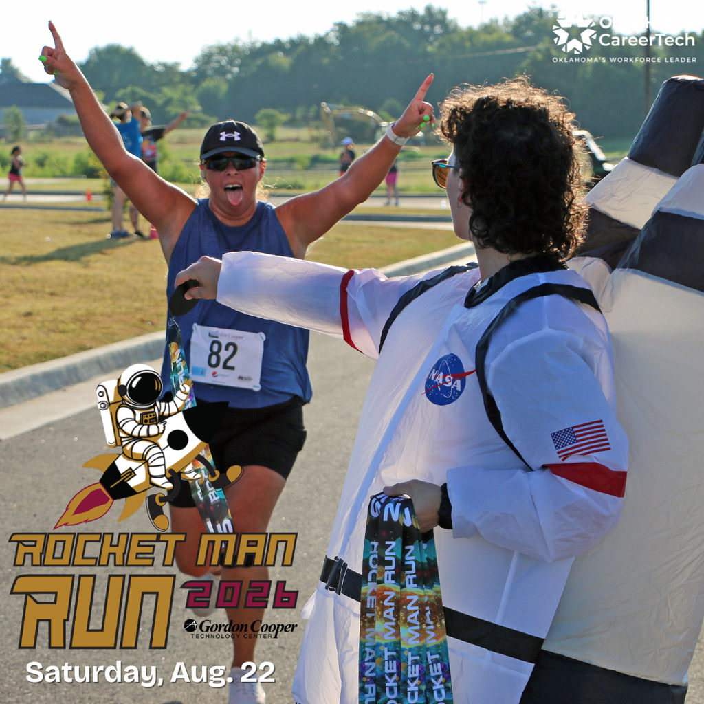Photo of running receiving a medal at 2025 Rocket Man Run
