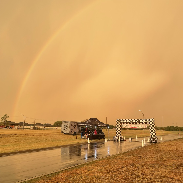 A picture of a rainbow over the Rocket Man Run finish line  