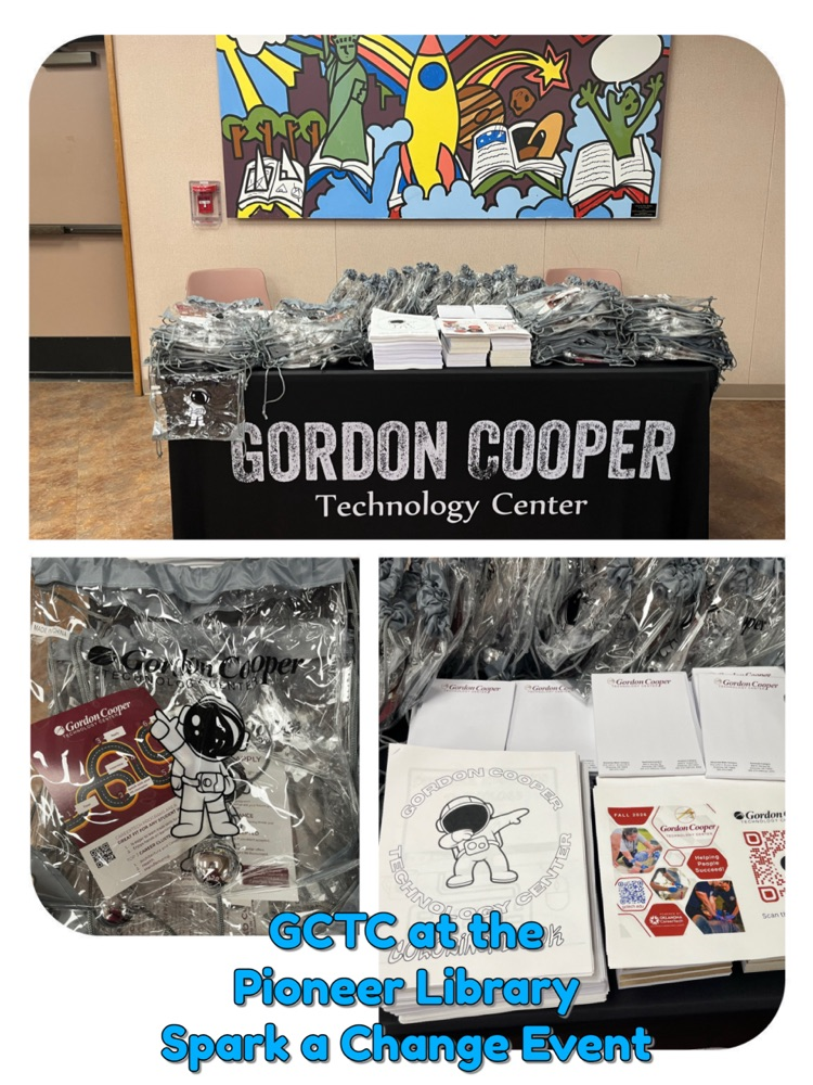 Gordon Cooper table with giveaways at local event 