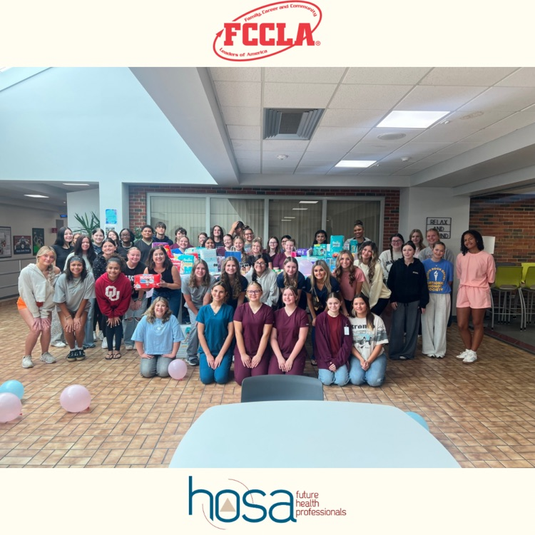 FCCLA and HOSA students pose with diapers collected for Legacy Parenting Center