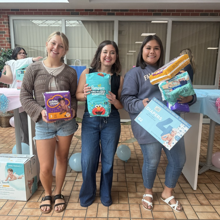 FCCLA and HOSA students pose with diapers collected for Legacy Parenting Center