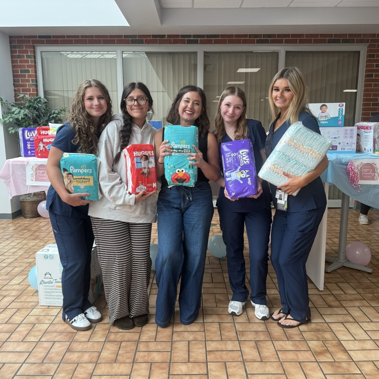 FCCLA and HOSA students pose with diapers collected for Legacy Parenting Center