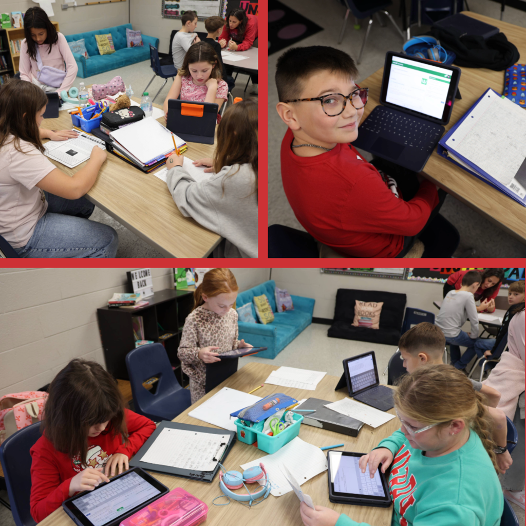 Students writing at RBES