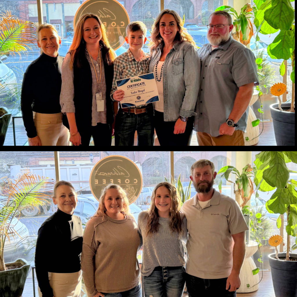 Students with their families and administrators being recognized by Kiwanis Club