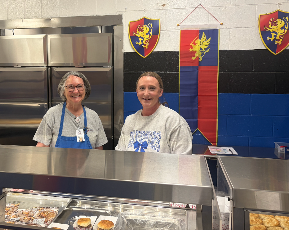 Annie Faucett, AMS cafeteria staff and Sky Cooper, "Celebrity Server" for National School Breakfast week