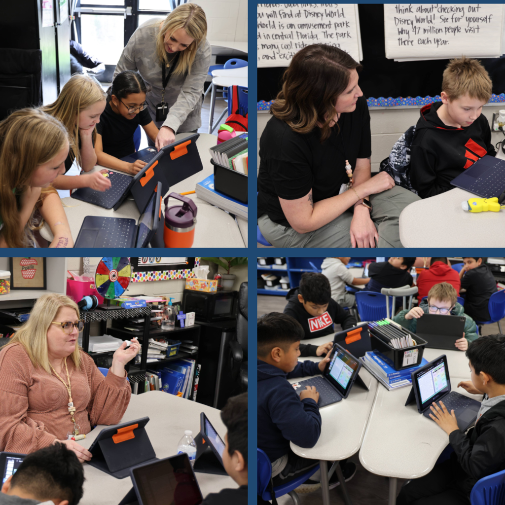Elementary students work in small groups using tablets while teachers circulate and provide guidance during a classroom lesson.