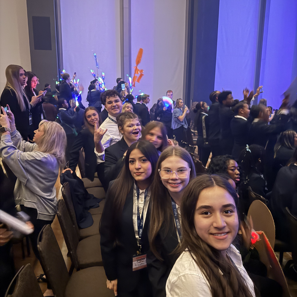 HOSA students at large group meeting at conference. 