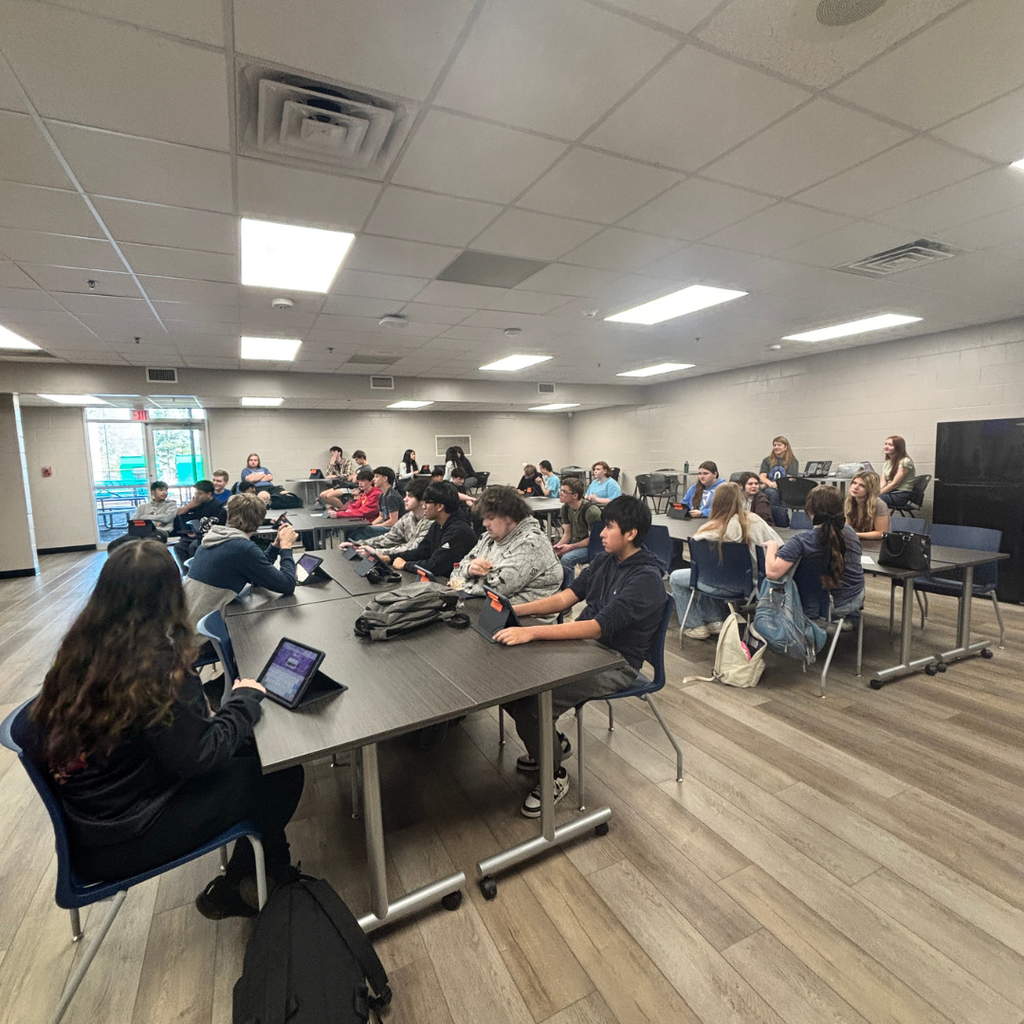 Homeroom representatives playing Kahoot Trivia for March Madness competition