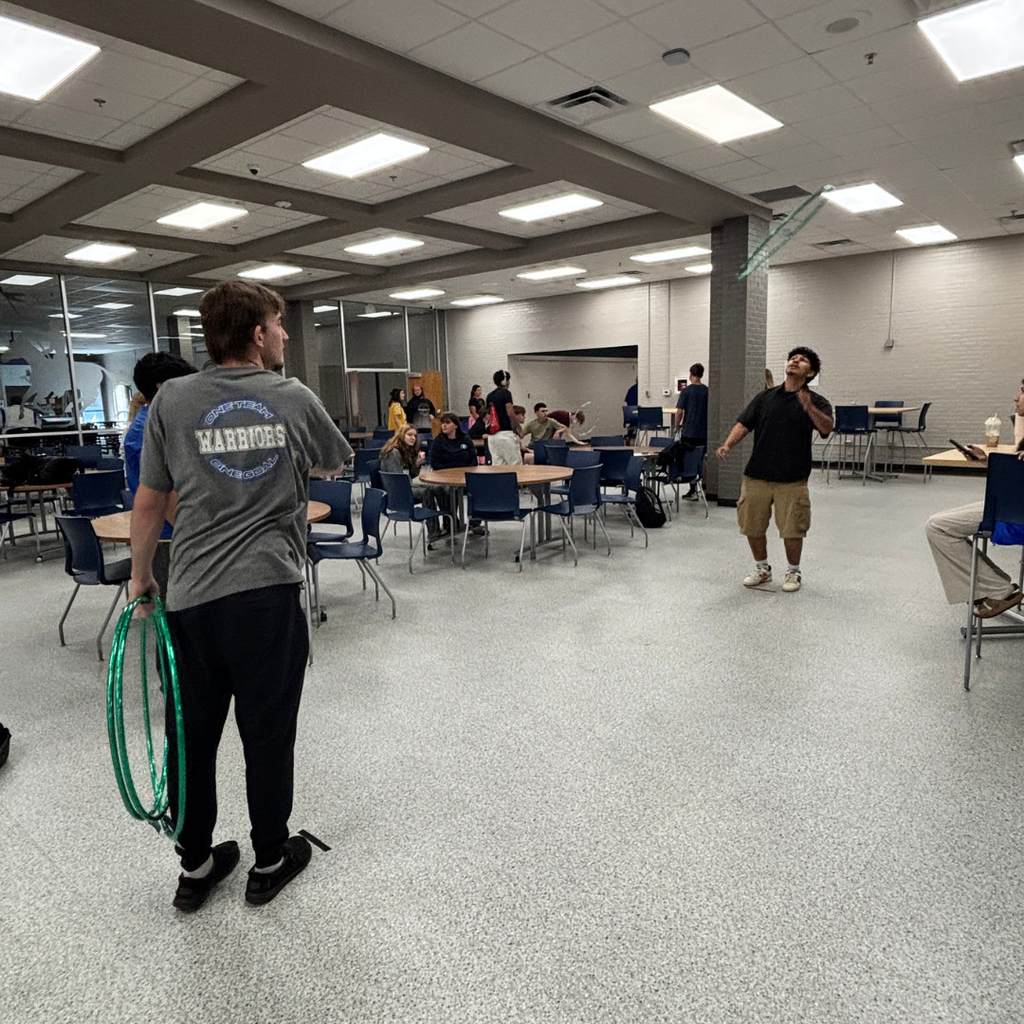 Students competing in Hula Hoop Toss for Homeroom March Madness Games