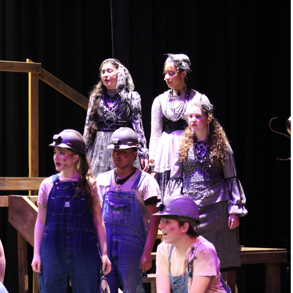 Students performing in Hadestown Spring Musical