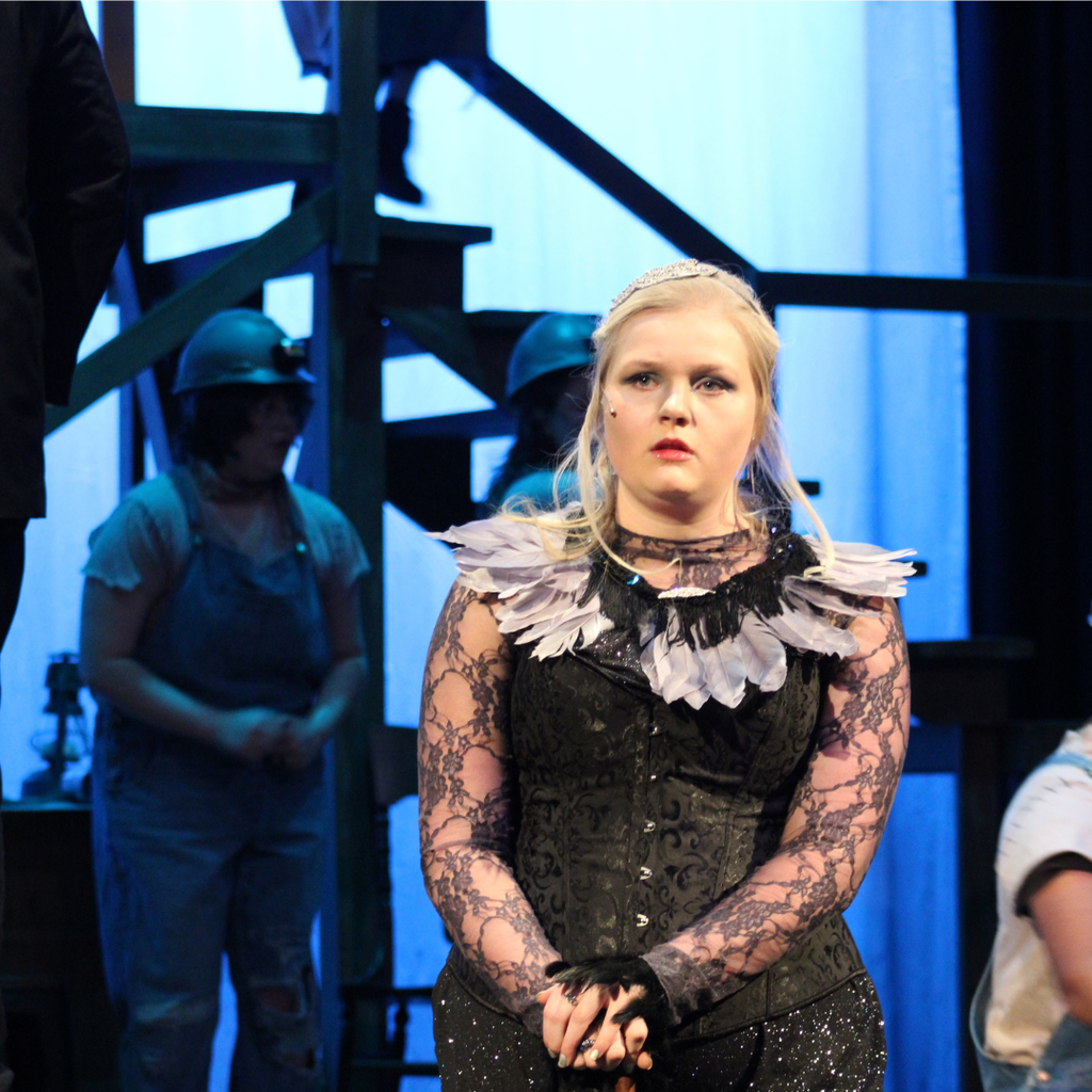 Student performing in Hadestown Spring Musical