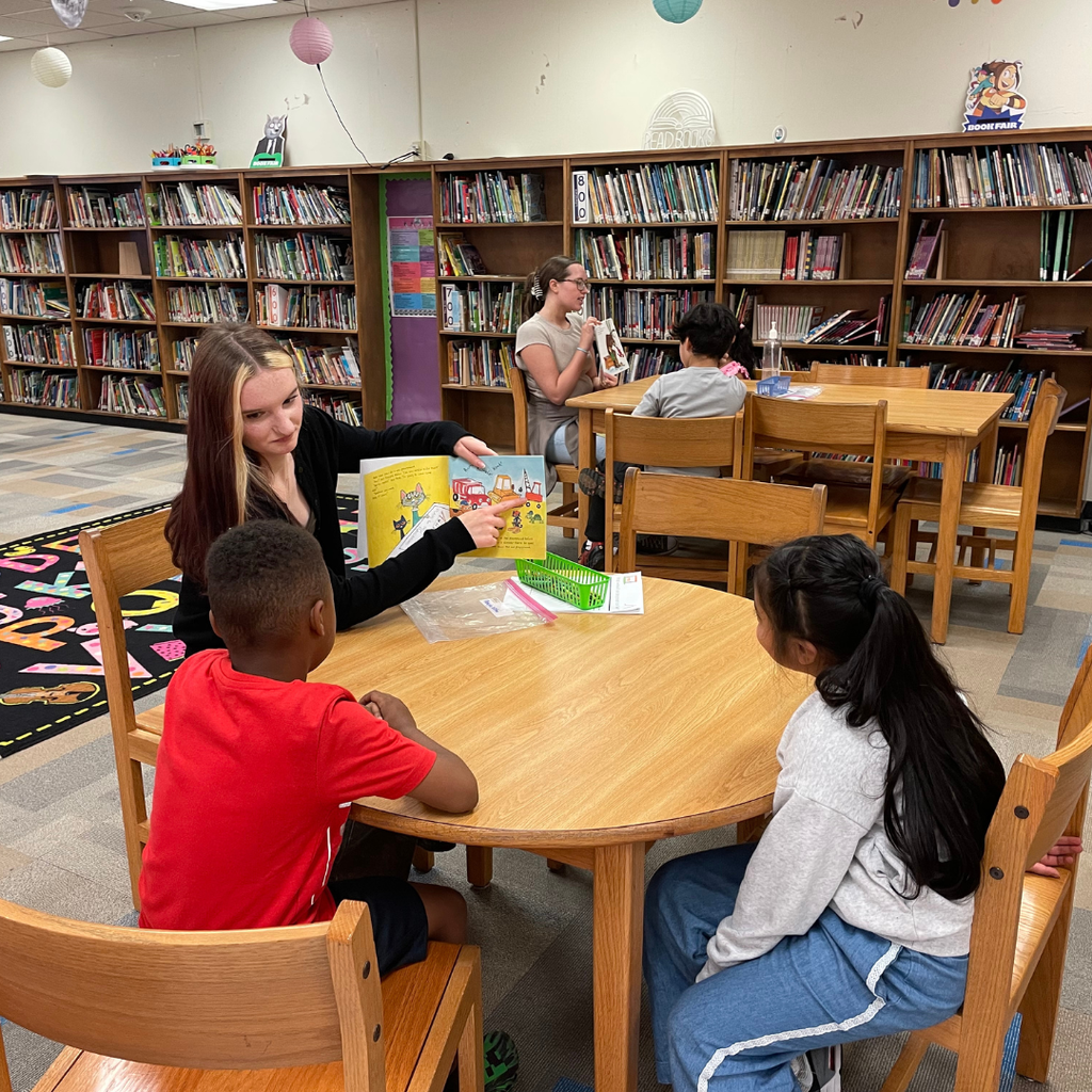 GCHS Teaching as a Profession Level 1 students reading to students at Belwood Elementary