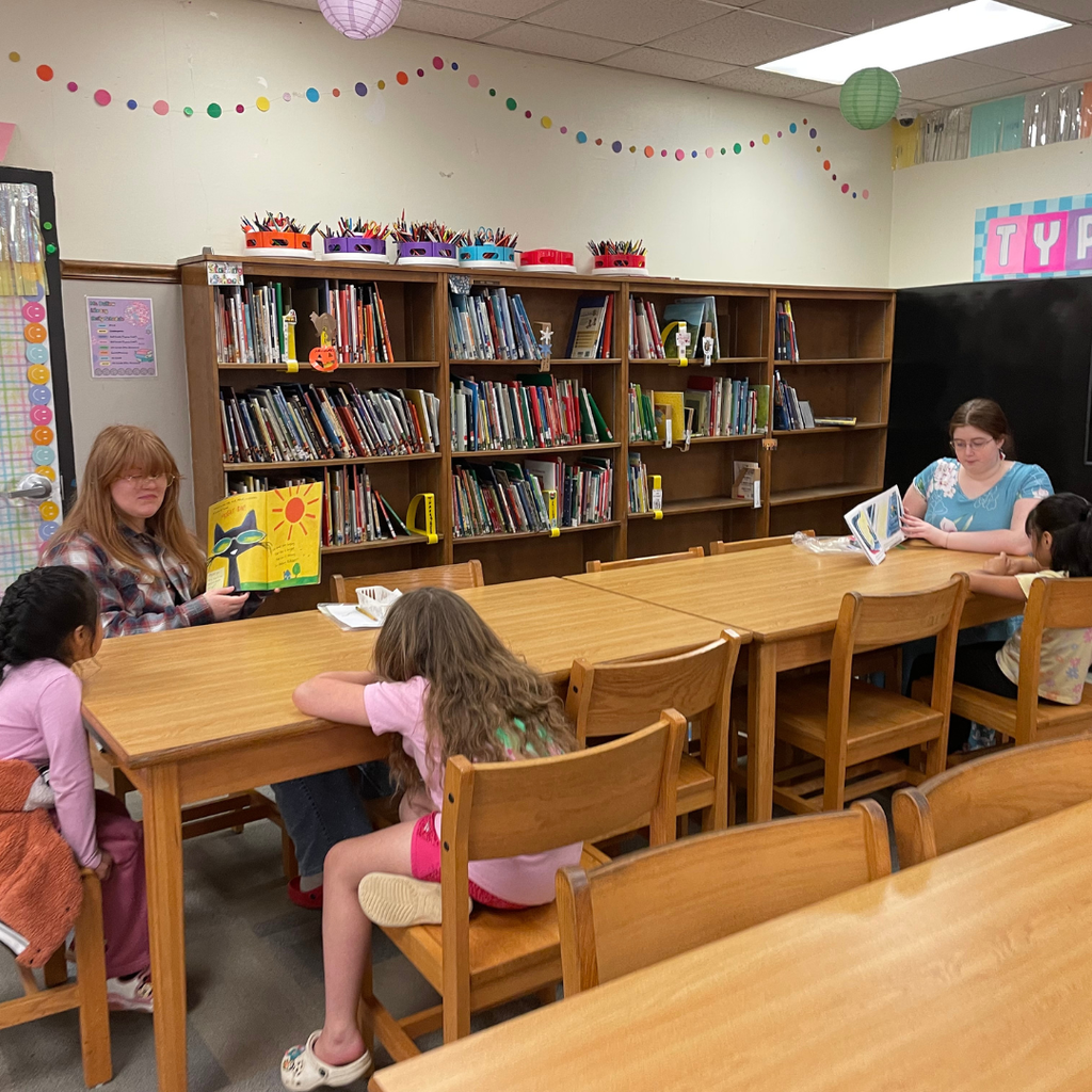 GCHS Teaching as a Profession Level 1 students reading to students at Belwood Elementary
