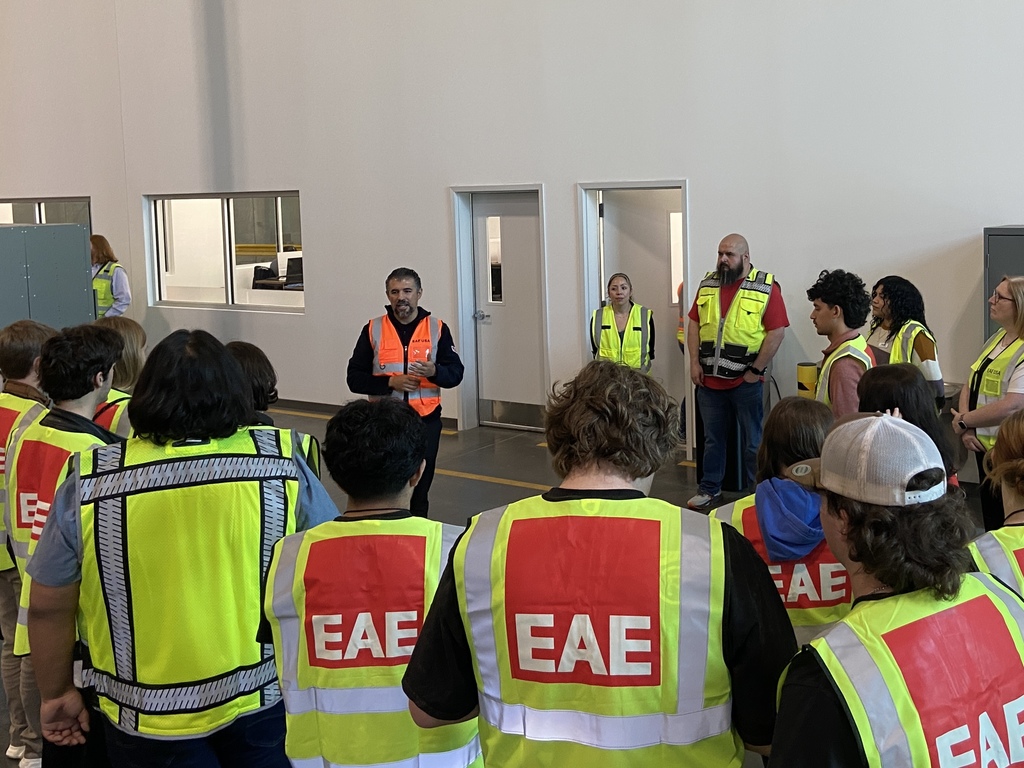 Students listening to safety instructions