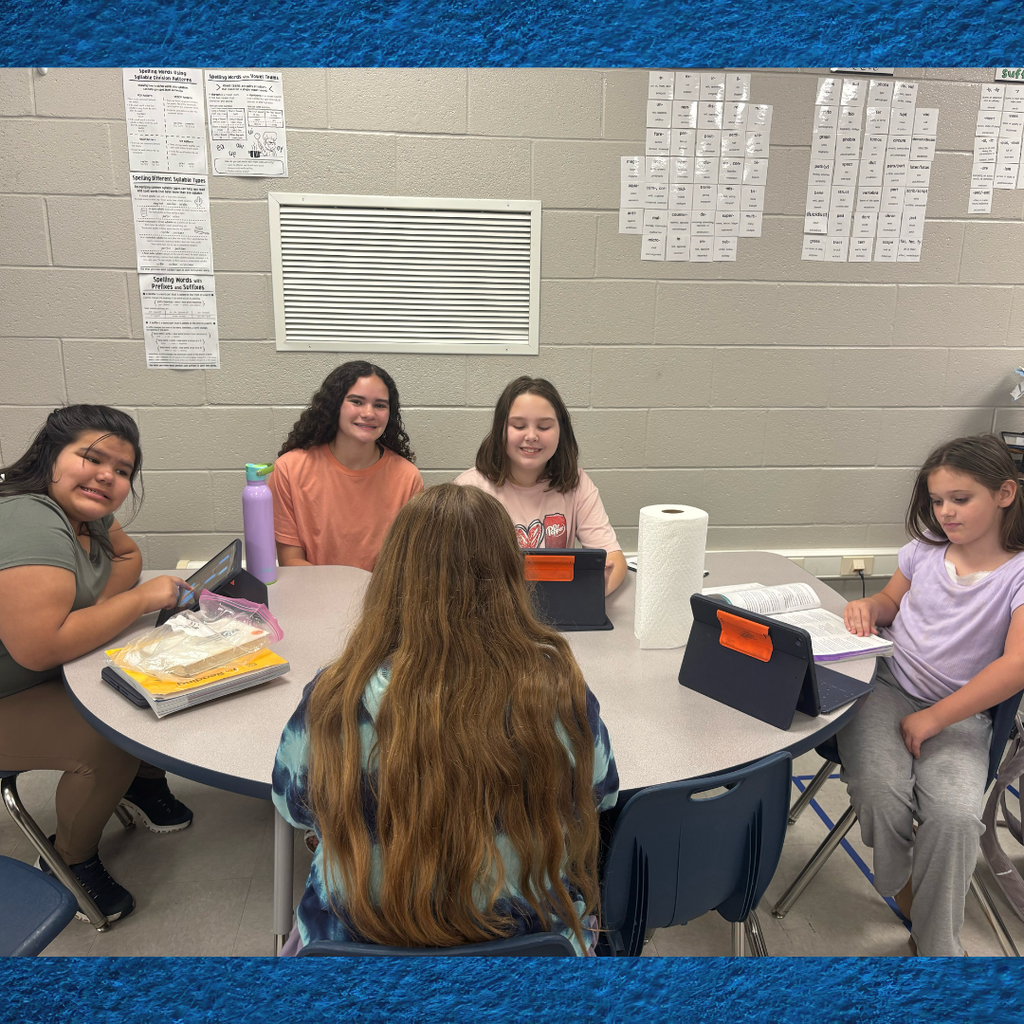 GCHS student working with small group of students