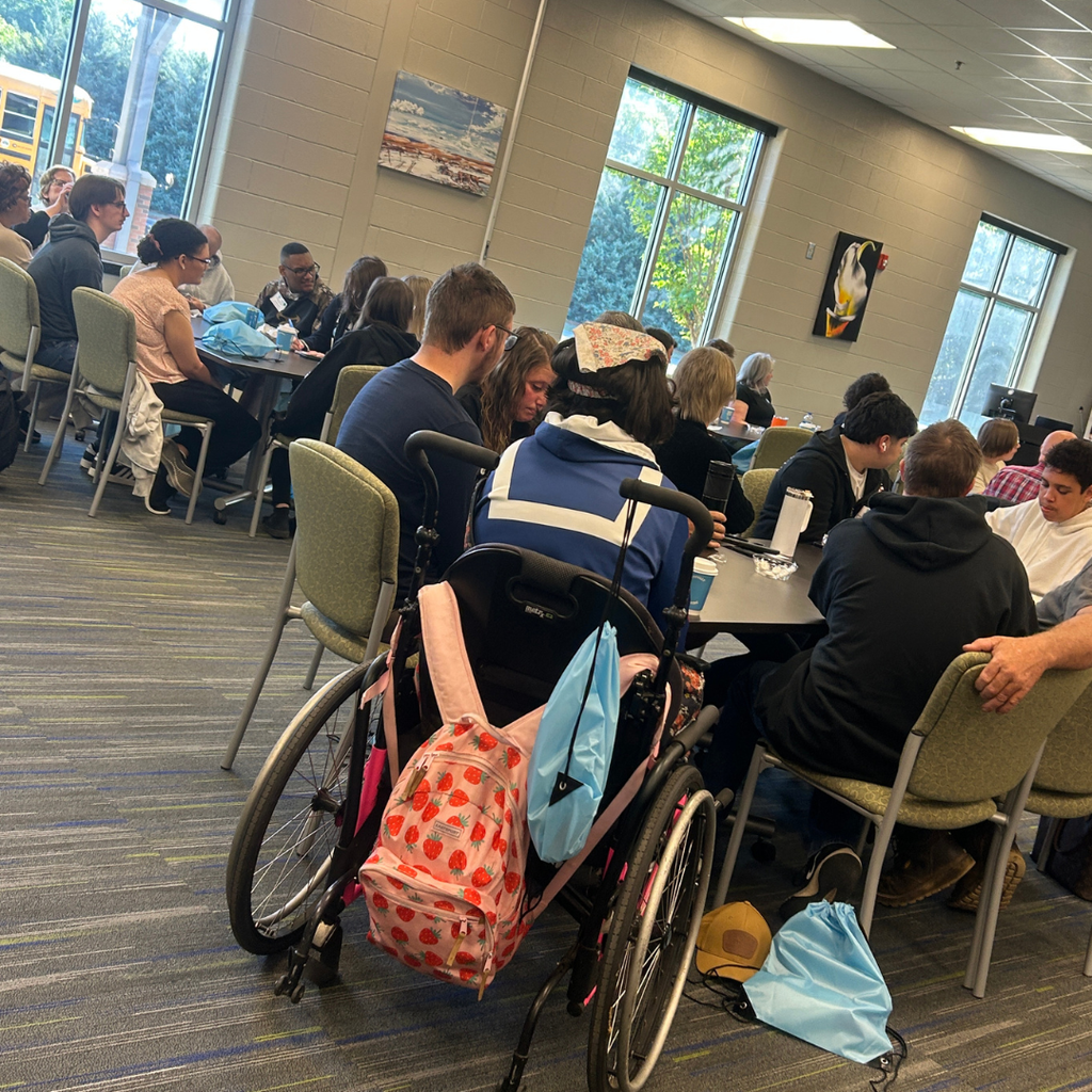 Picture of students, parents and teachers at GA CTI Transition Fair