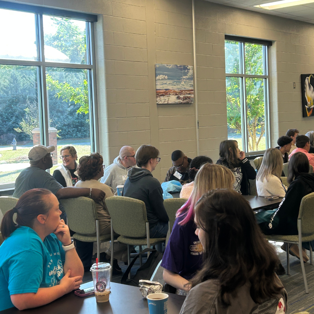 Picture of students, parents and teachers at GA CTI Transition Fair