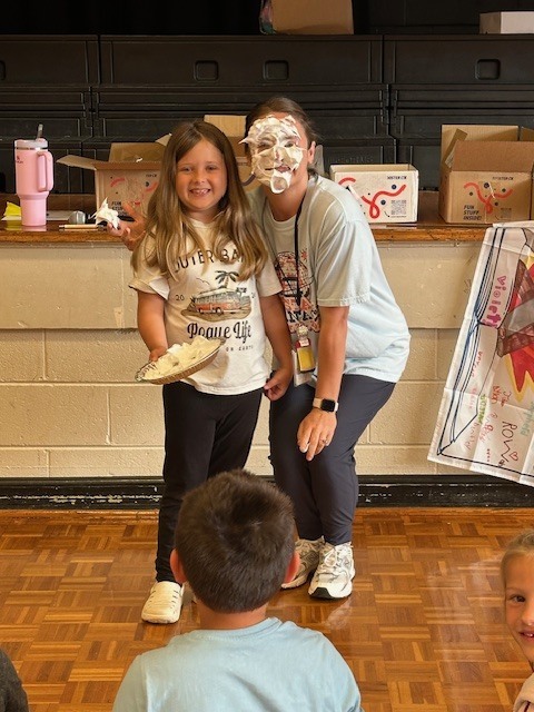 Two more students got to "pie" Coach Ballew!