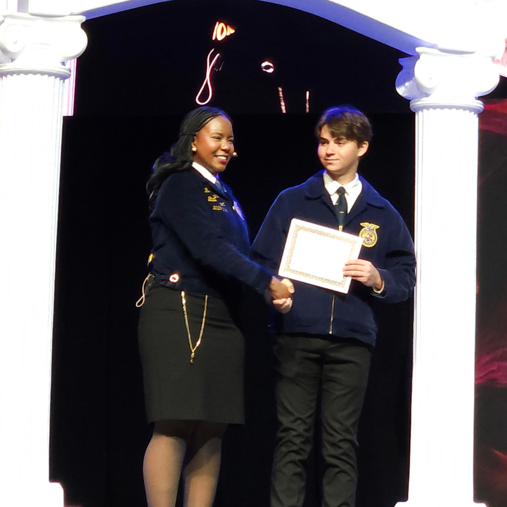 William Parish receiving his state FFA degree at the state FFA convention