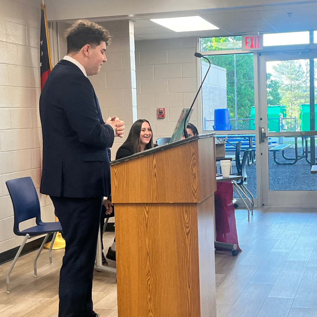 GCHS HOSA Officer Peyton Schwartz speaking to HOSA students
