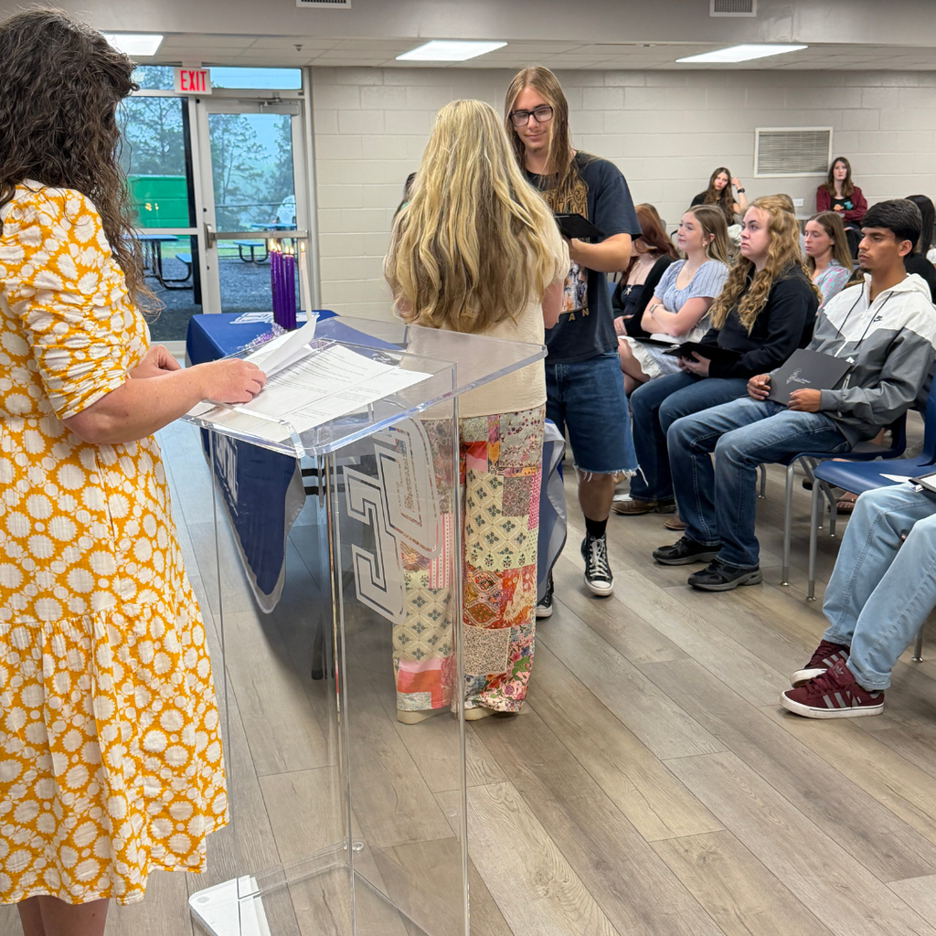 GCHS student receiving NTHS Honor Society certificate