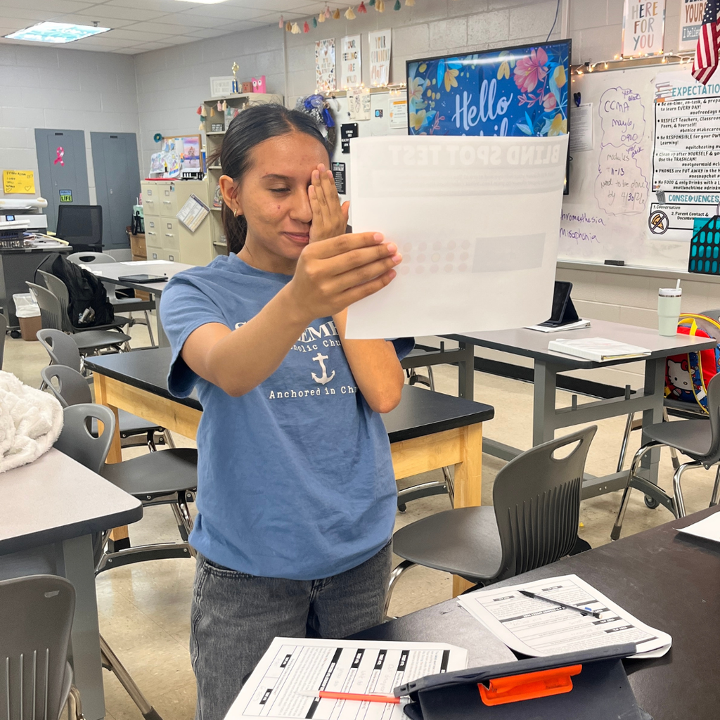 Student in Essentials of Healthcare doing lab stations for the nervous system