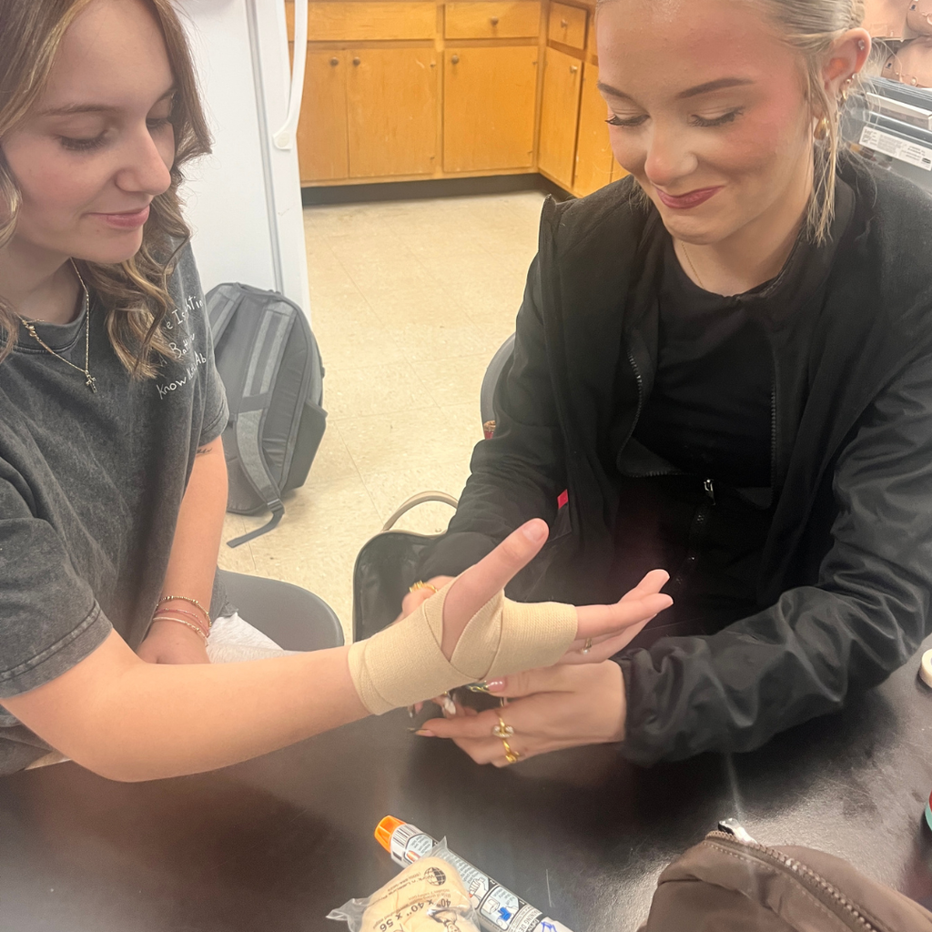 Mrs. Lee's Intro to Healthcare students practicing first aid