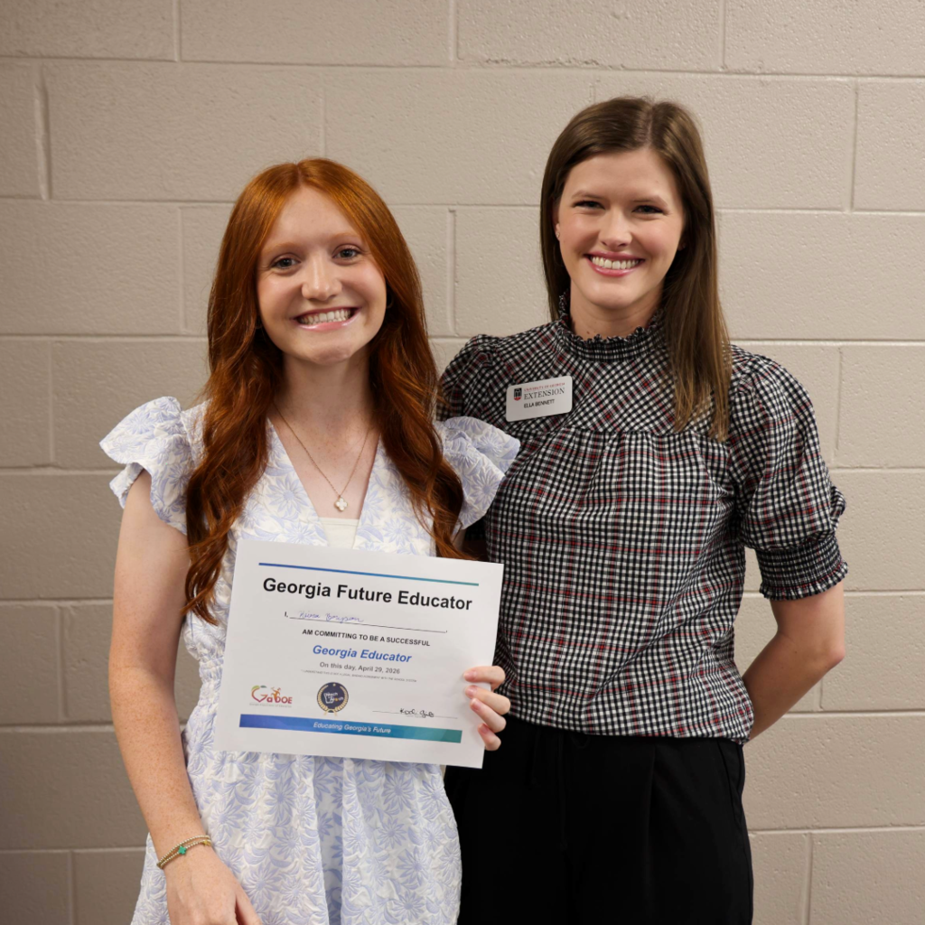 Student with college representative at the event