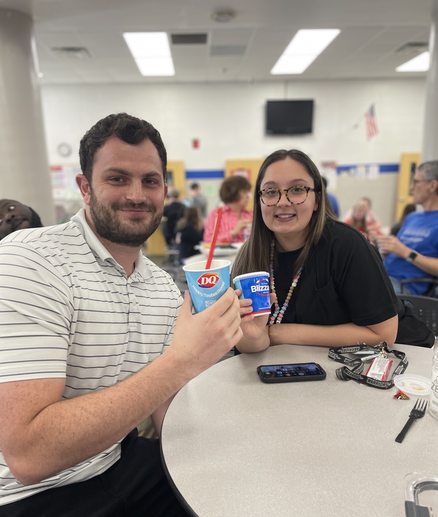 Zach McKenzie and Kendall Jones eating a DQ blizzard during Teacher Appreciation Week
