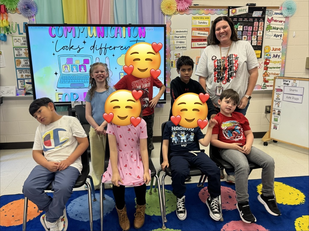 SLP teacher with class of students