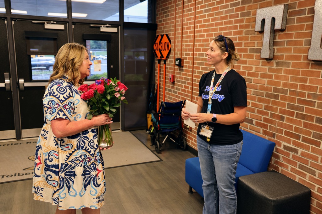 Flowers presented to Emily Rossberg from Kim Gallman