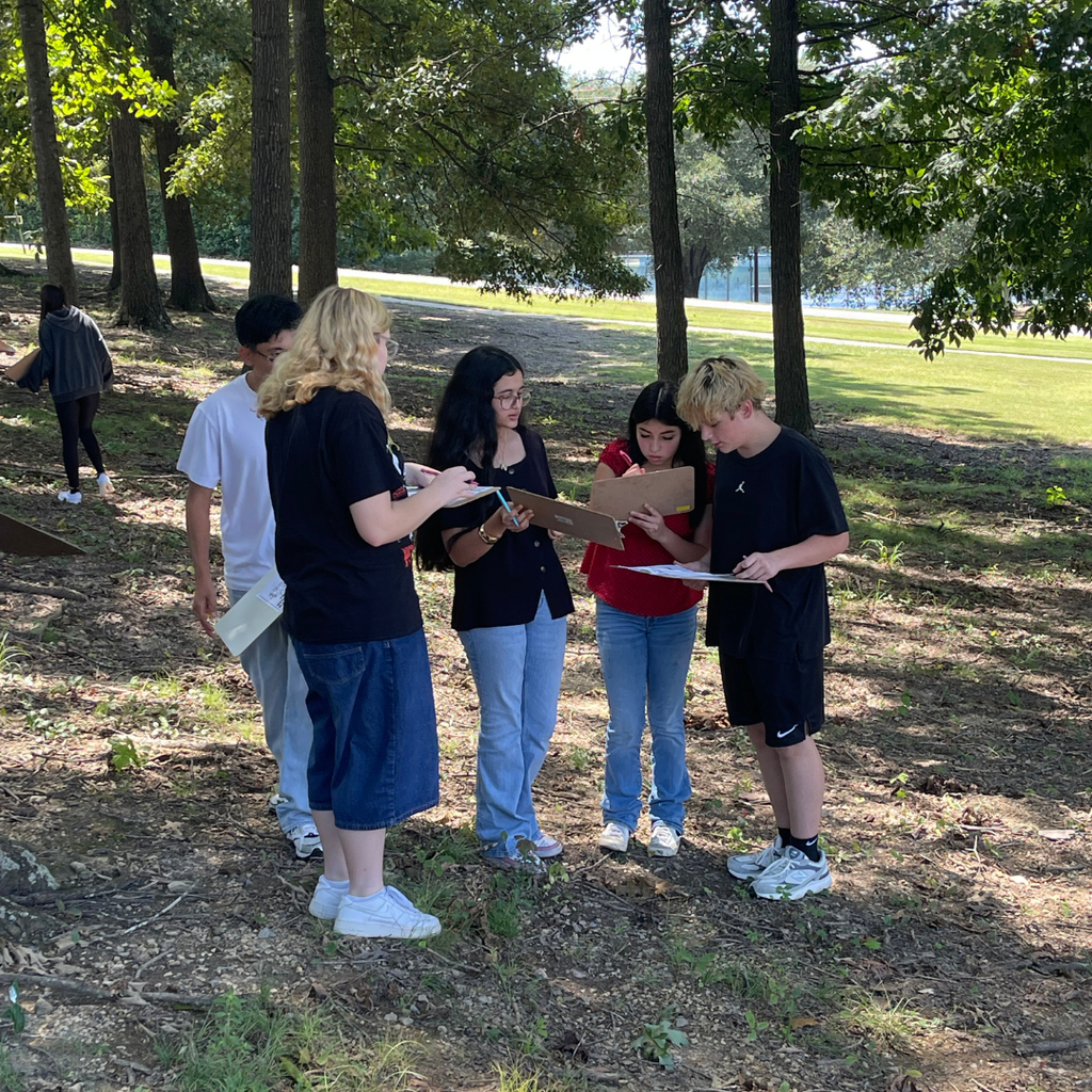 Mrs. Weaver's Environmental Science participating in an ecosystem scavenger hunt for Unplugged Wednesday