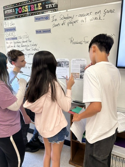 Students in Ms. Massengale’s and Mr. Peacock’s eighth-grade social studies classes worked in stations last week to learn more about the reasons that the Georgia colony was created.