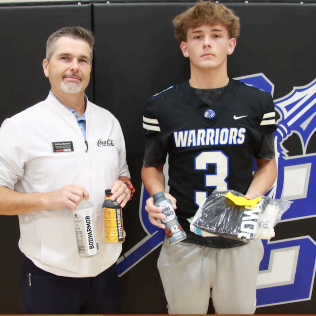 Nathan Medlock (Coca Cola rep) with Bently Talley (Football) - Aug. 2026 Player of the Month