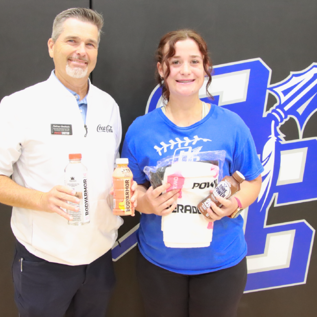 Nathan Medlock (Coca Cola rep) with Bella Hardin (Softball) - Aug. 2026 Player of the Month