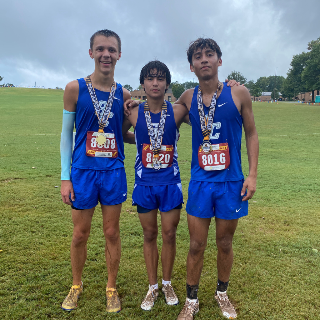 Cross Country members (Austin Zufelt, Junior Martinez and Daniel Fraire) with their medals from the Carrollton Invitational. .  