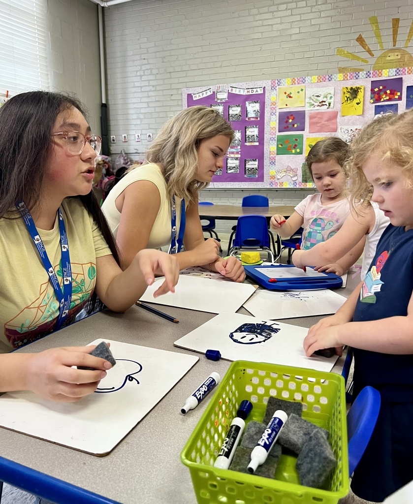 Students working in Mrs. Holland's ECE class.