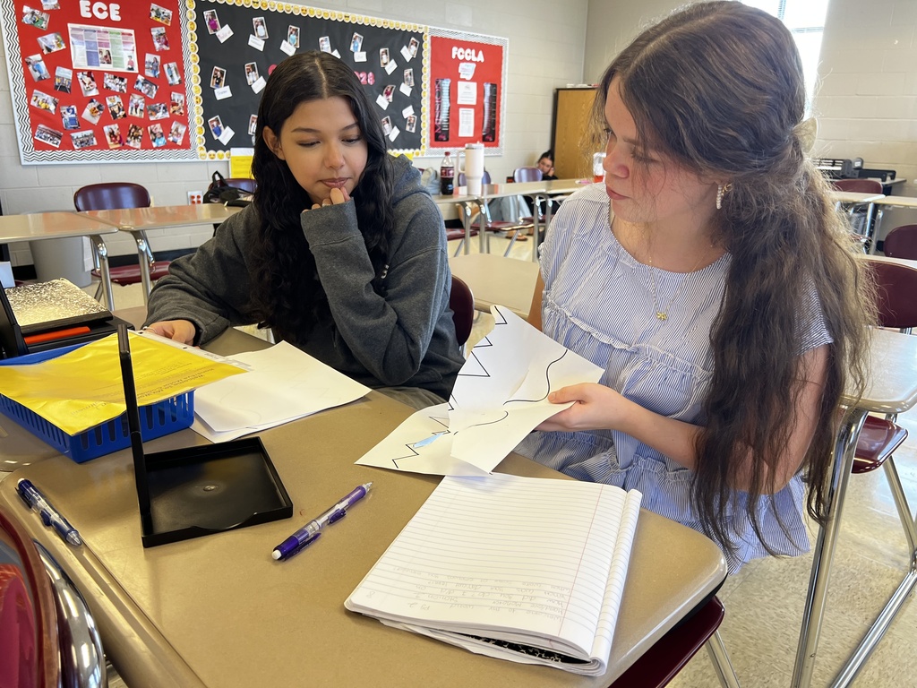 Students working in Mrs. Holland's ECE class.