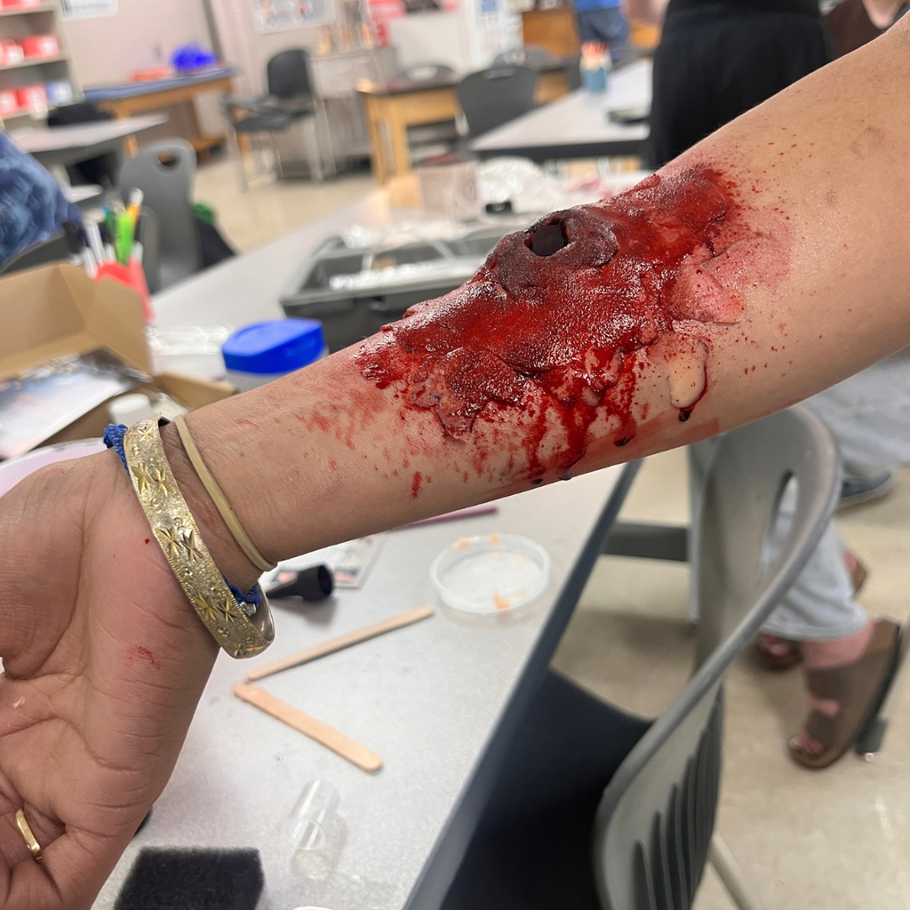 Mrs. Lee's Allied Health Class practicing sterile wound care