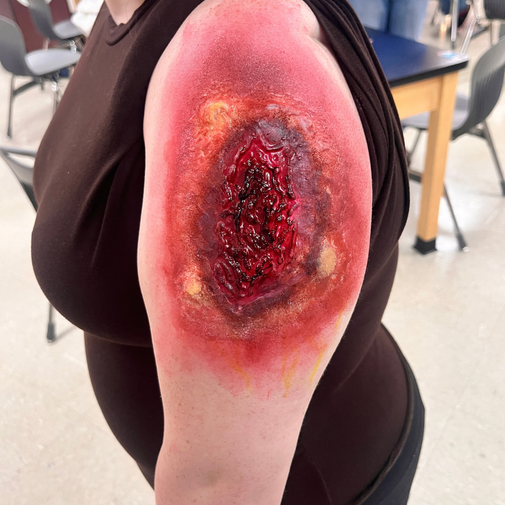 Mrs. Lee's Allied Health students practicing sterile wound care