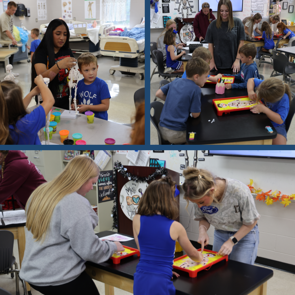 Students working with elementary school students on activities
