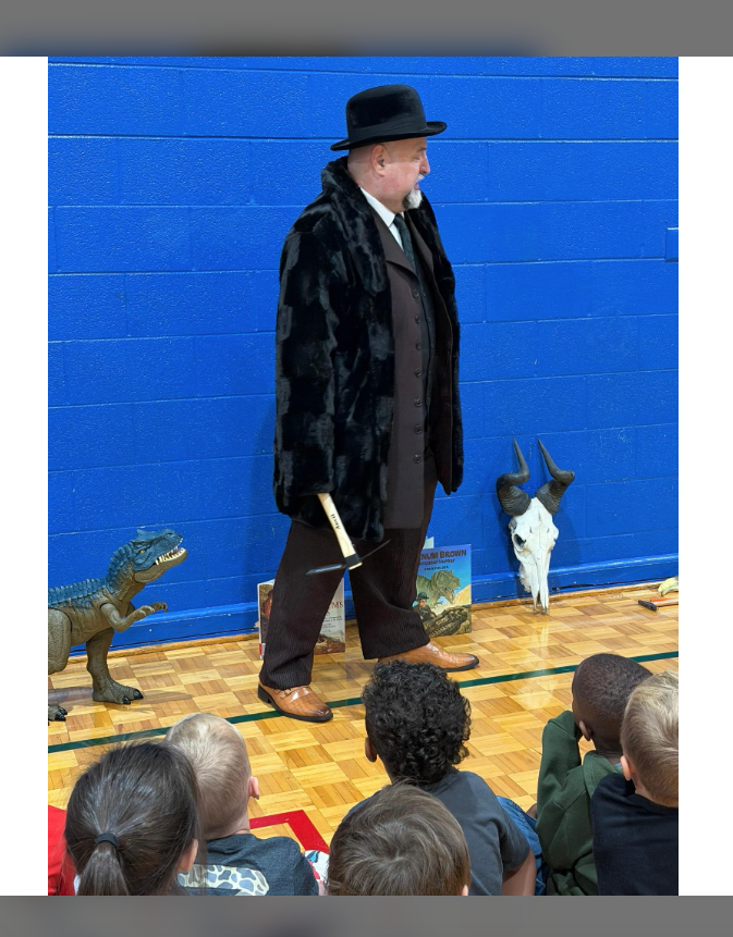 Mr. Terry Allee entertained Kindergarten-2nd Grade students with an interactive presentation of Barnum Brown. The archeologist who found the first bones of the Tyrannosaurus Rex 🦖. Students were engaged in the storytelling by Mr. Allee. Thank you for such an amazing experience!
