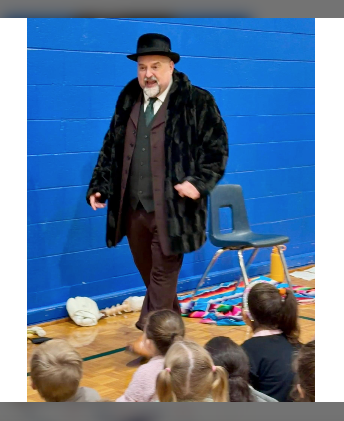Mr. Terry Allee entertained Kindergarten-2nd Grade students with an interactive presentation of Barnum Brown. The archeologist who found the first bones of the Tyrannosaurus Rex 🦖. Students were engaged in the storytelling by Mr. Allee. Thank you for such an amazing experience!