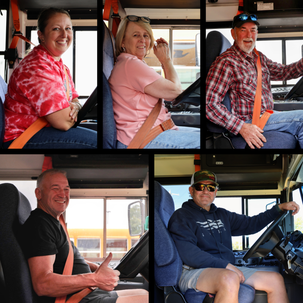 School bus drivers in their buses