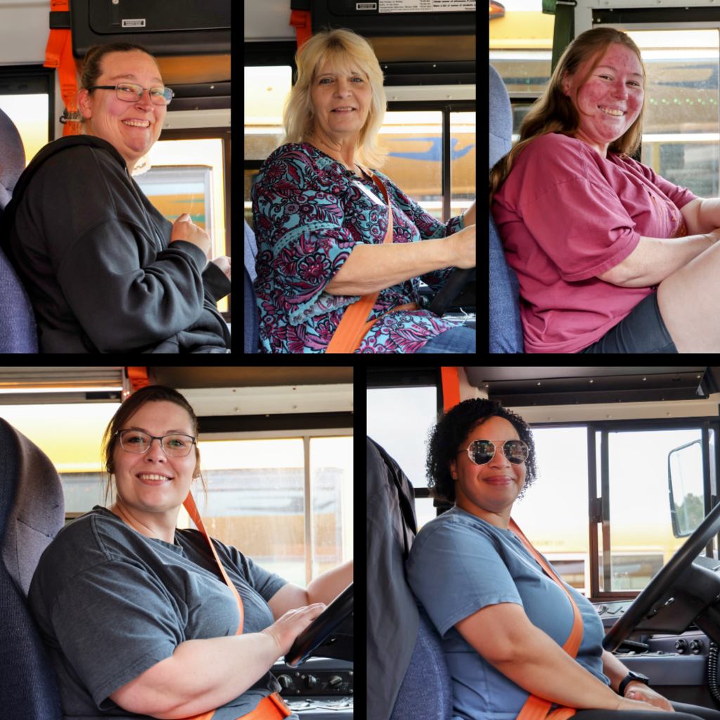School bus drivers in their buses