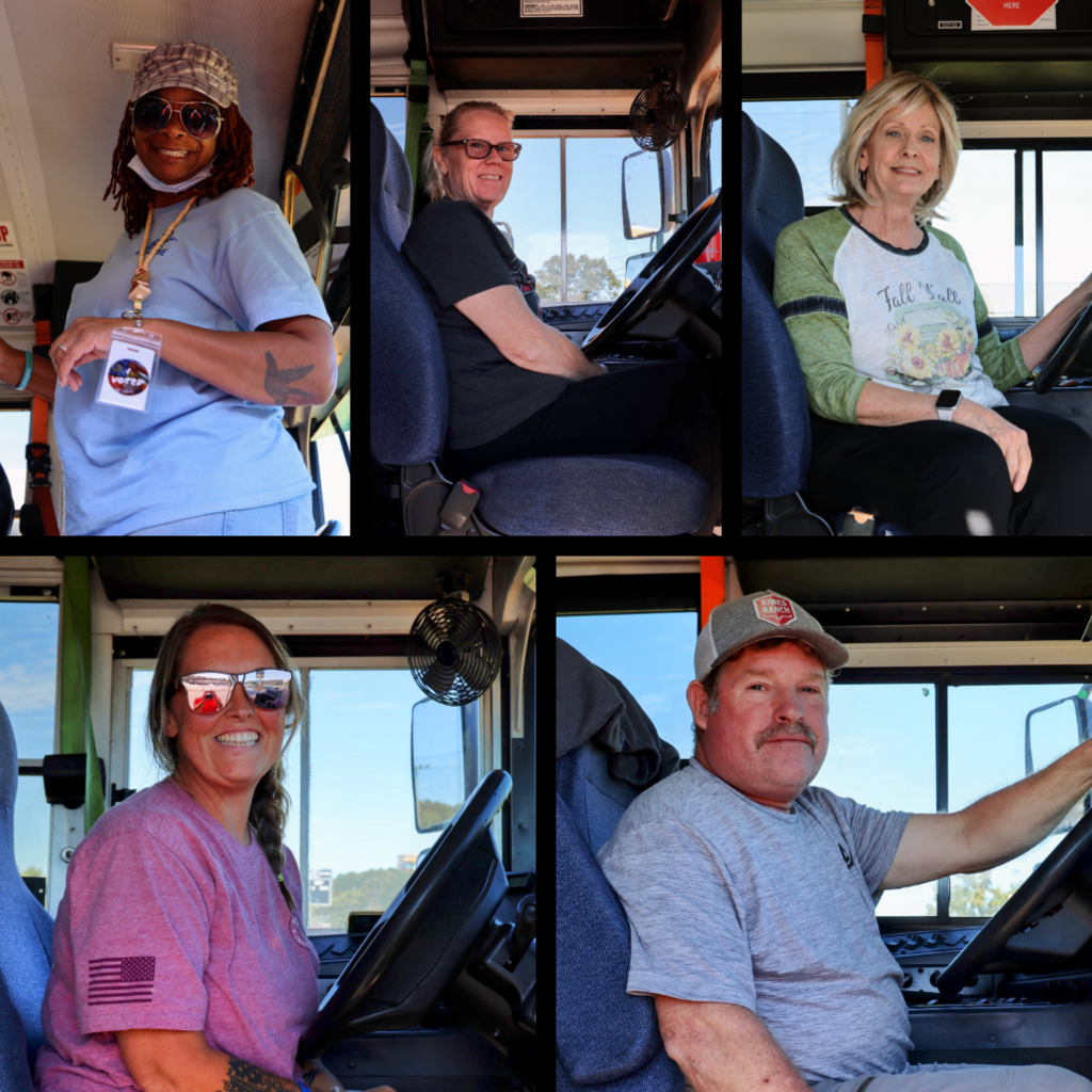 School bus drivers in their buses