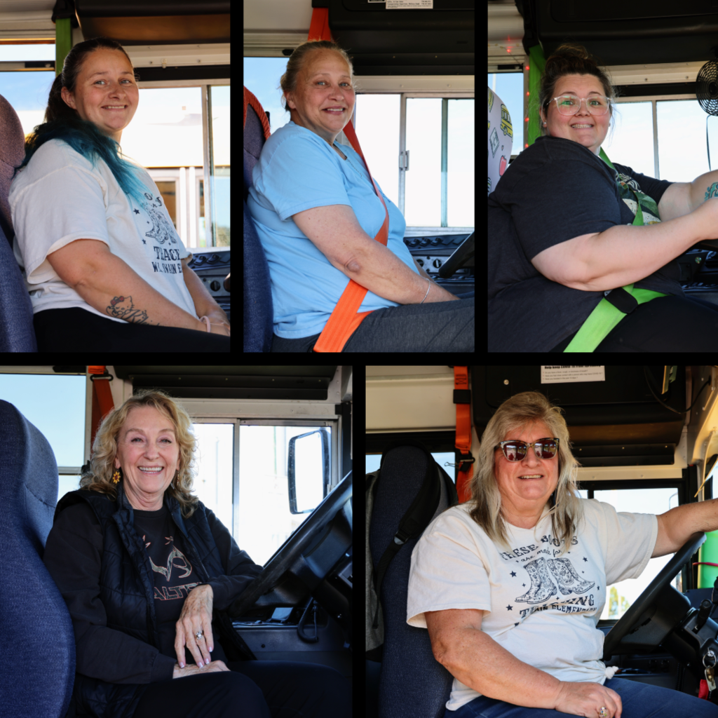 School bus drivers in their buses
