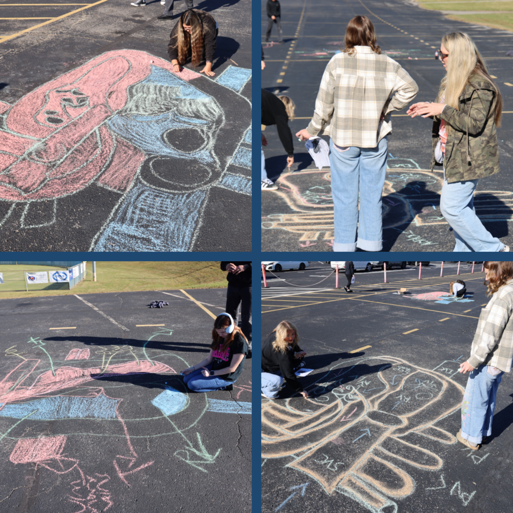 Students drawing with chalk